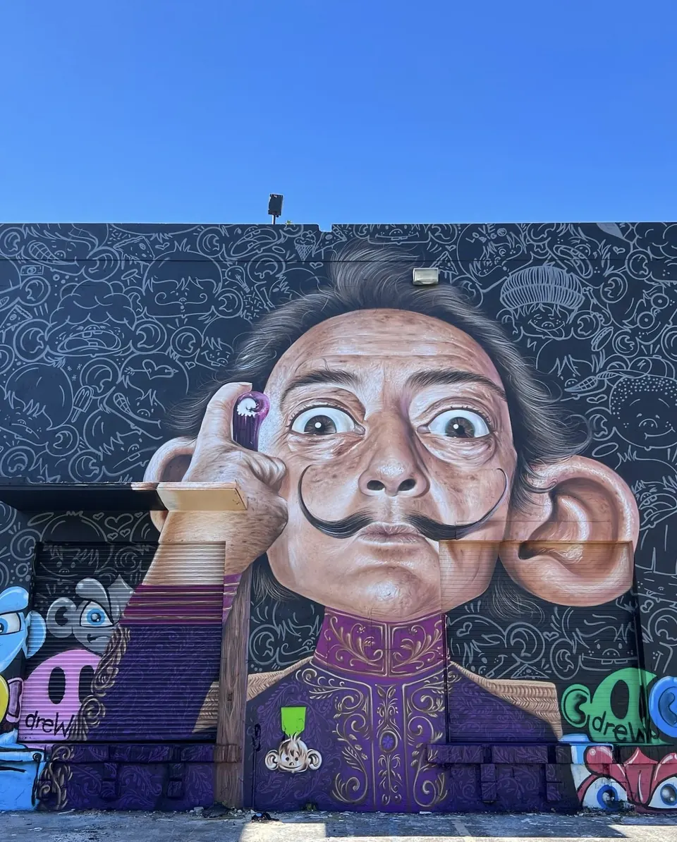 Mural of Salvador Dali with a curled moustache
