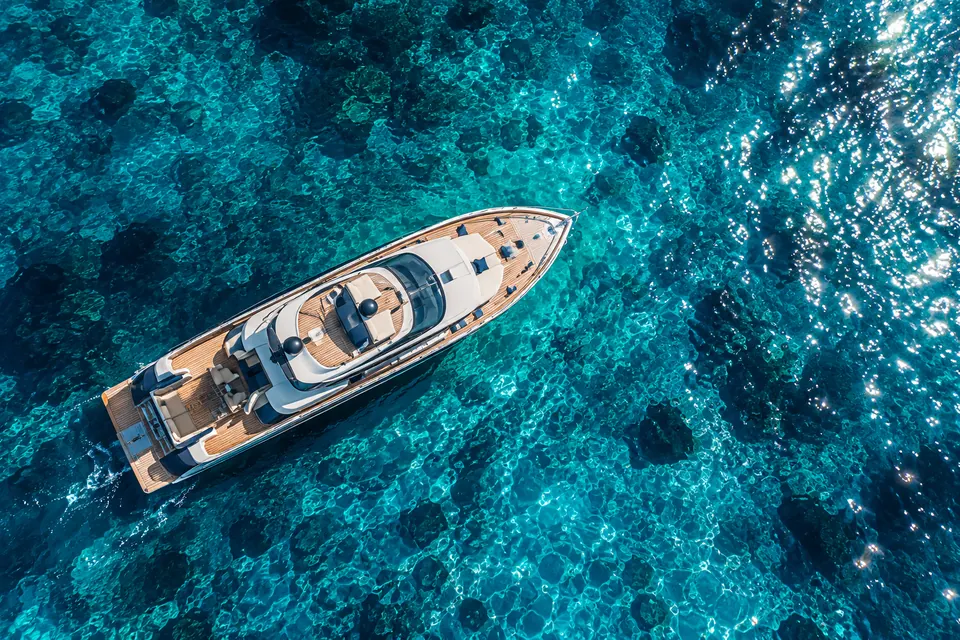 Sunlit Yacht in Turquoise Waters